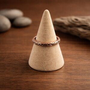 Copper coloured thin band ring